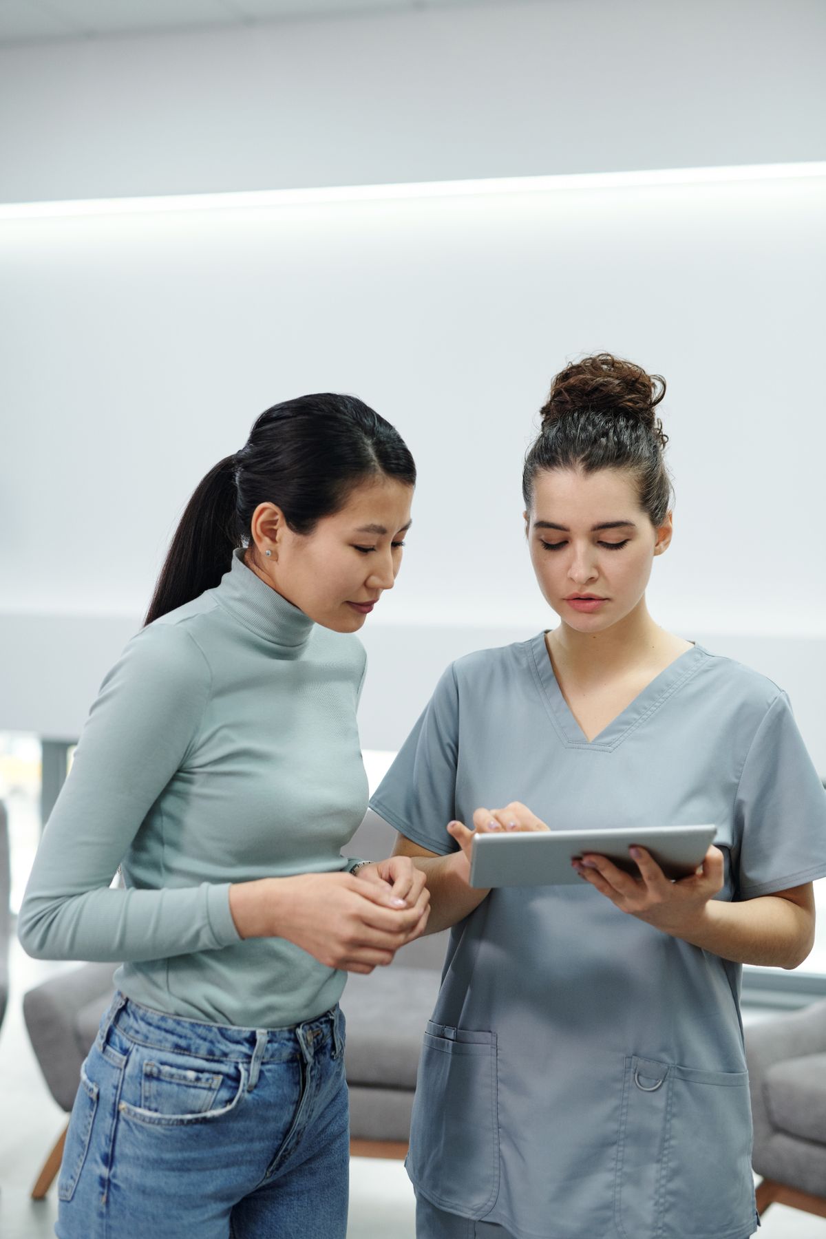 Physician and practice staff reviewing growth data together
